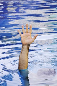Hand of drowning businessman
